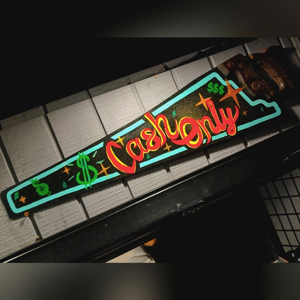 Handpainted "cash only" vintage handsaw art